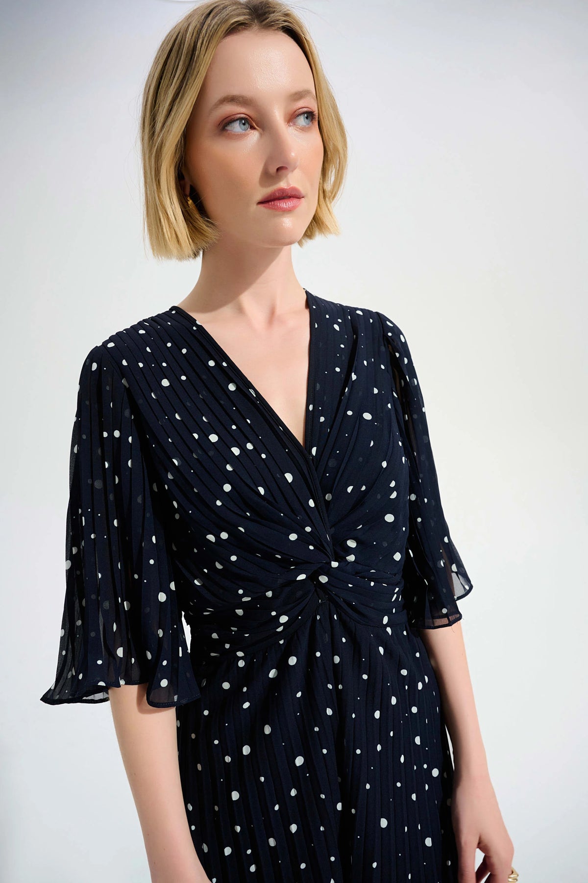 Joseph Ribkoff Midght Blue/ Vanilla Signature | Pleated Chiffon Dot Print Wide Leg Jumpsuit With Knot Detail