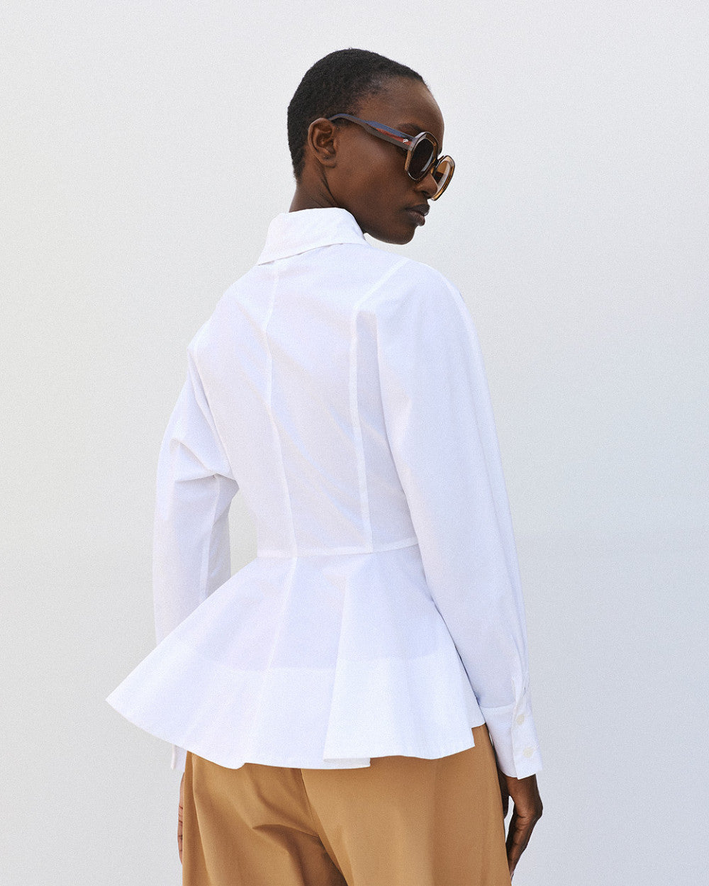 Access Fashion White Shirt With A Peplum Hem