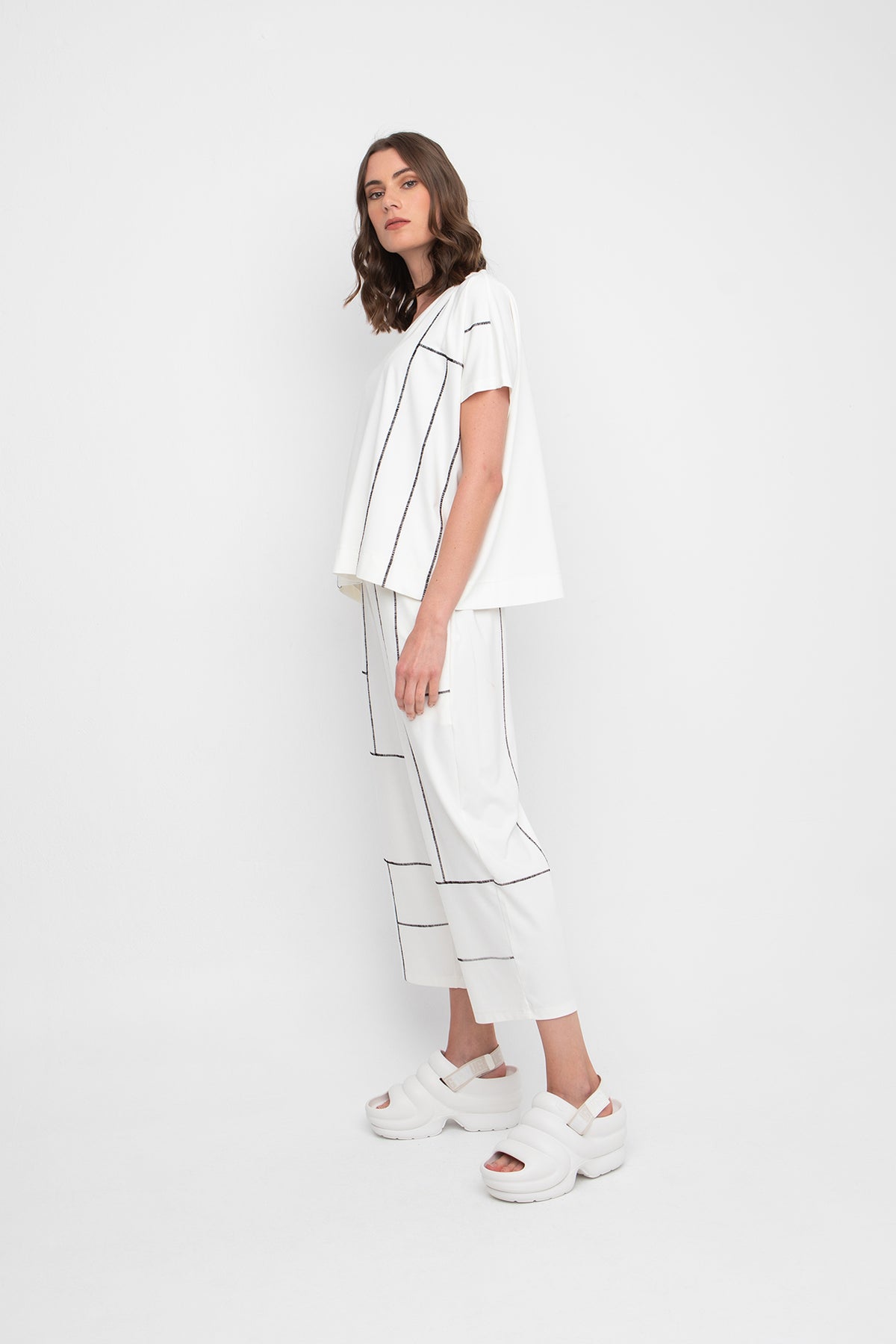 Ozai N Ku Front Pocket Ivory Top with Black Stitching